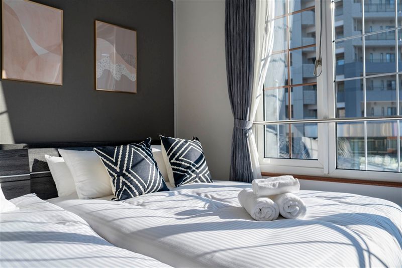 Bedroom with window and beds